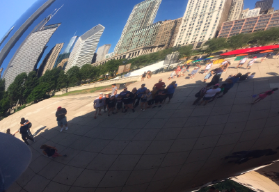 Michael Bowen and his family pose for a photo with the Chicago Bean