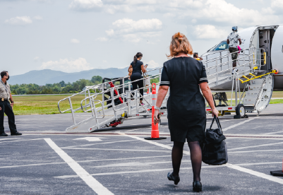 travelers at Shenandoah Valley Airport board a plane